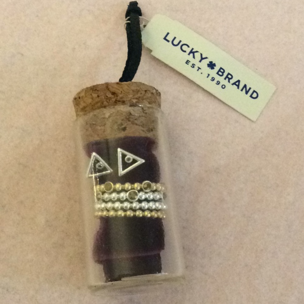 NWT. Lucky Brand jewelry in a bottle